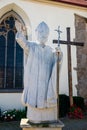 Bolkow, Poland - August 08, 2021. Catholic church of Saint Jadwiga in Main square with statue of Pope John Paul II