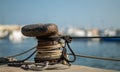 A bollard for fishing boats in the harbor on Spain`s east coast. Royalty Free Stock Photo