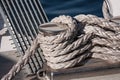 A bollard made of corrosion-resistant steel is installed on the pier of the seaport. Royalty Free Stock Photo