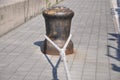 Bollard mooring leash. Ship attached with a thick rope to a bollard in the harbour. on the Bulbous bow of cargo ship Royalty Free Stock Photo