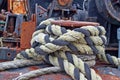 Bollard with rope on the deck of an old ship Royalty Free Stock Photo