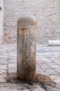 Bollard stone, road post.