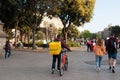 Bologna, Italy - 13 april 2019: young boy glovo rider making delivery on his bike working in the so called gig economy barcelona Royalty Free Stock Photo