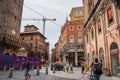 Bologna ITALY - 9 August 2023 - Real people and tourists in square next famous Due Torri