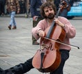 Busker playing cello in Bologna. Busking on street