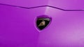 Bologna, Italy - December 3, 2019: Lamborghini logo on a purple hood.  Luxury stylish sport car. Royalty Free Stock Photo