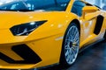 Bologna, Italy - December 9, 2019: Original yellow Lamborghini Aventador. Logo and front grill, headlights. Luxury stylish sport c Royalty Free Stock Photo