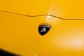 Bologna, Italy - December 9, 2019: Original yellow Lamborghini Aventador. Logo and front grill, headlights. Luxury stylish sport c Royalty Free Stock Photo