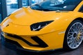 Bologna, Italy - December 9, 2019: Original yellow Lamborghini Aventador. Logo and front grill, headlights. Luxury stylish sport c Royalty Free Stock Photo