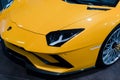 Bologna, Italy - December 9, 2019: Original yellow Lamborghini Aventador. Logo and front grill, headlights. Luxury stylish sport c Royalty Free Stock Photo