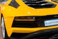 Bologna, Italy - December 9, 2019: Original yellow Lamborghini Aventador. Logo and front grill, headlights. Luxury stylish sport c Royalty Free Stock Photo