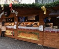 People shopping in French Christmas market in Bologna, Piazza Minghetti, Italy