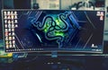 PC gaming concept - an ultrawide screen with the Razer logo on as Windows wallpaper. Razer is a company that make pro Royalty Free Stock Photo