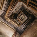Bologna, Italy - 17 Nov, 2022: Inside the wooden staircase of the Asinelli Tower
