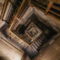 Bologna, Italy - 17 Nov, 2022: Inside the wooden staircase of the Asinelli Tower