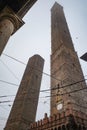 Bologna, Italy - 16 Nov, 2022: The two famous falling towers of Asinelli and Garisenda Royalty Free Stock Photo