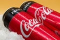 Can of Coca Cola on ice with water droplets. Royalty Free Stock Photo