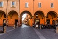 BOLOGNA, ITALY - OCTOBER 22, 2018: Porticoes at Giuseppe Verdi square in Bologna, Ita Royalty Free Stock Photo