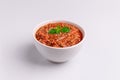 Bolognese also know as Bolognesa or Bolonhesa sauce in a white bowl isolated in white background, soft light, studio photo, copy Royalty Free Stock Photo