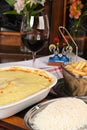 bolognese lasagna baked with cheese ham red sauce spices and meat with french fries and rice Royalty Free Stock Photo