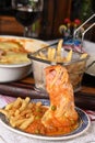 bolognese lasagna baked with cheese ham red sauce spices and meat with french fries and rice Royalty Free Stock Photo