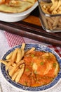 bolognese lasagna baked with cheese ham red sauce spices and meat with french fries and rice Royalty Free Stock Photo