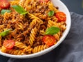 Bolognese pasta. Fusilli with tomato sauce, ground minced beef, Royalty Free Stock Photo