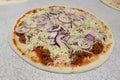 Bolognese pizza. Unbaked pizza. Bolognese sauce in pizza. Royalty Free Stock Photo