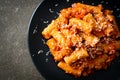 Rigatoni pasta bolognese with cheese