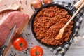 Bolognese sauce cooking in a frying pan horizontal top view Royalty Free Stock Photo