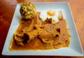 Bolon de verde with fried eggs and meat stew ecuadorian food galapagos