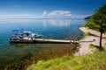 Bolshiye Koti, RUSSIA - JULY 18: macrophototour, members of team are waiting boat and taking pictures near lake Baikal