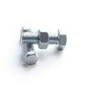 A bolt and nut made of metal. Lie on a white background. Isolated on a white background. Close-up Royalty Free Stock Photo