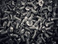 Bolts in large quantities in one box Royalty Free Stock Photo