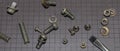 Bolts, nuts, washers on a black magnetic Mat Royalty Free Stock Photo