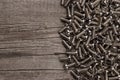 Bolts on the wooden table