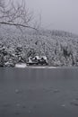 Bolu Golcuk National Park, lake wooden house on a snowy winter day in the forest in Turkey Royalty Free Stock Photo