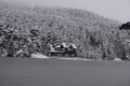 Bolu Golcuk National Park, lake wooden house on a snowy winter day in the forest in Turkey Royalty Free Stock Photo