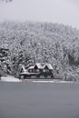 Bolu Golcuk National Park, lake wooden house on a snowy winter day in the forest in Turkey Royalty Free Stock Photo