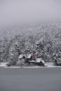 Bolu Golcuk National Park, lake wooden house on a snowy winter day in the forest in Turkey Royalty Free Stock Photo