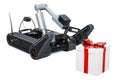 Bomb disposal robot with dangerous gift box, 3D rendering Royalty Free Stock Photo