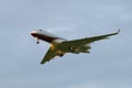 The Bombardier BD-700-1A11 Global 5000 M-KBSD in cloudy sky Royalty Free Stock Photo