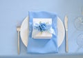 Bonbonniere candy-box and napkin on dish Royalty Free Stock Photo