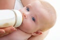 Bond little baby blue eyes drinking bottle milk