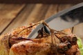 Bondage shibari roasted chicken on wooden background, cutting co Royalty Free Stock Photo