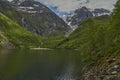 Bondhusbreen Glacier hanging over the Bondhusvatnet Lake Royalty Free Stock Photo