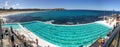 BONDI BEACH, AUSTRALIA - AUGUST 18, 2018: Locals and tourists enjoy the famous Iceberg Pools. This is a major destination in