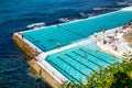 BONDI BEACH, AUSTRALIA - AUGUST 18, 2018: Tourists and locals at the Iceberg Pools Royalty Free Stock Photo