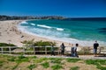 BONDI BEACH, AUSTRALIA - AUGUST 18, 2018: Tourists visit coastline and beach. Bondi Beach is a famous tourist attraction Royalty Free Stock Photo