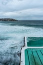 Bondi icebergs pool moody morning day with waves crashing